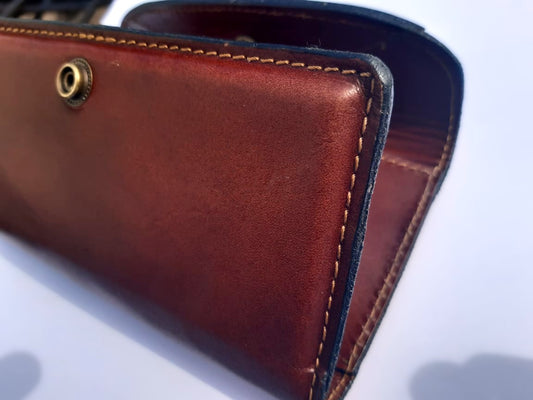 Moulded veg leather compartment for phone